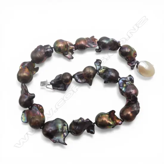 STRING OF LARGE BLACK COLOURED BAROQUE PEARLS S/SILVER CLASP