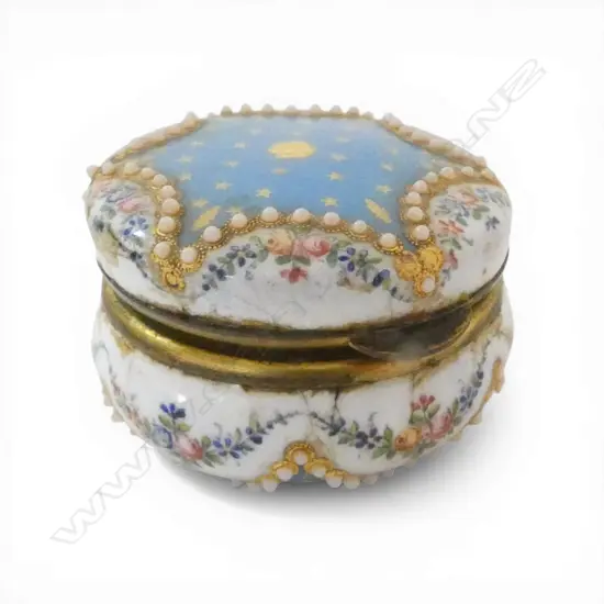 19thC French Limoge enamel patch box with fine painted floral swags and pearl type highlights. Dia.45mm.