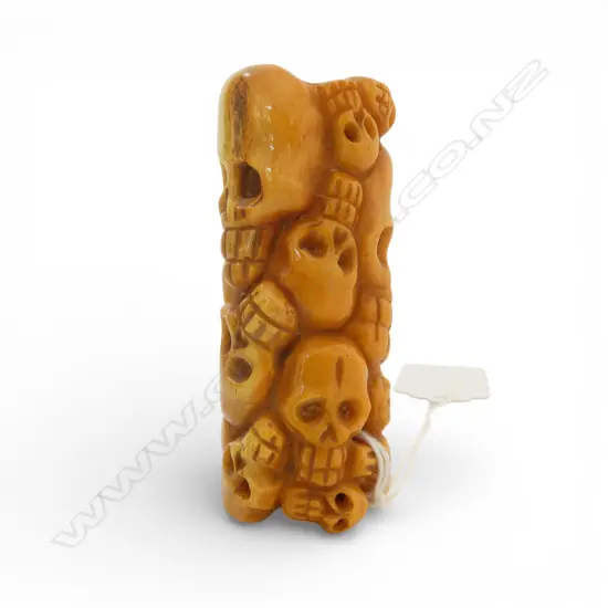 CARVED SKULLS BEAD - BONE? L.65mm