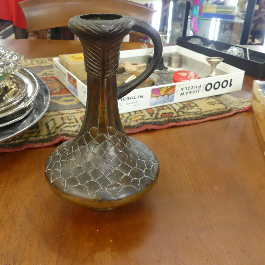 JAPANESE MEIJI BRONZE STORK HANDLED VASE. Fish scale detail to the spreading base. H.220mm Image 1++