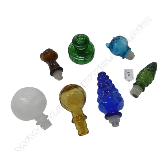 7 ASST. COLOURED GLASS STOPPERS