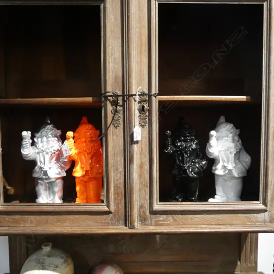 4 RESIN GNOMES HOLDING GUNS; BLACK, WHITE, ORANGE & SILVER H.300mm