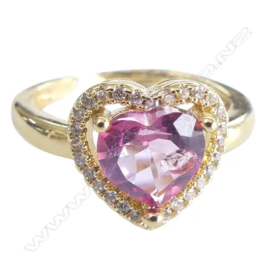 PINK TOPAZ RING  in plated mount, adjustable size, stone faulted