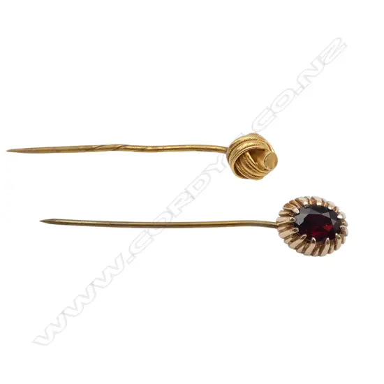 2 STICK PINS; 9CT GARNET STONE 4gms, 18CT KNOT both pins are PLATED 1.6gms