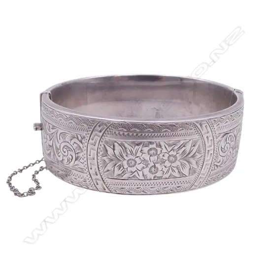 VINTAGE STG SILVER ENGRAVED HINGED BANGLE, wax filled. 47.63gm