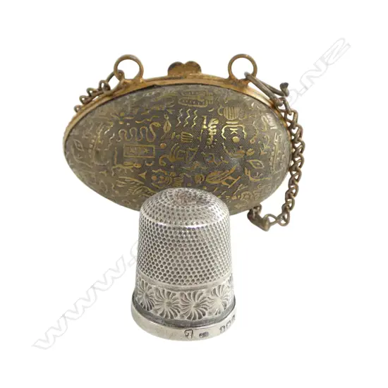 STG SILVER THIMBLE IN BRASS EGG CASE