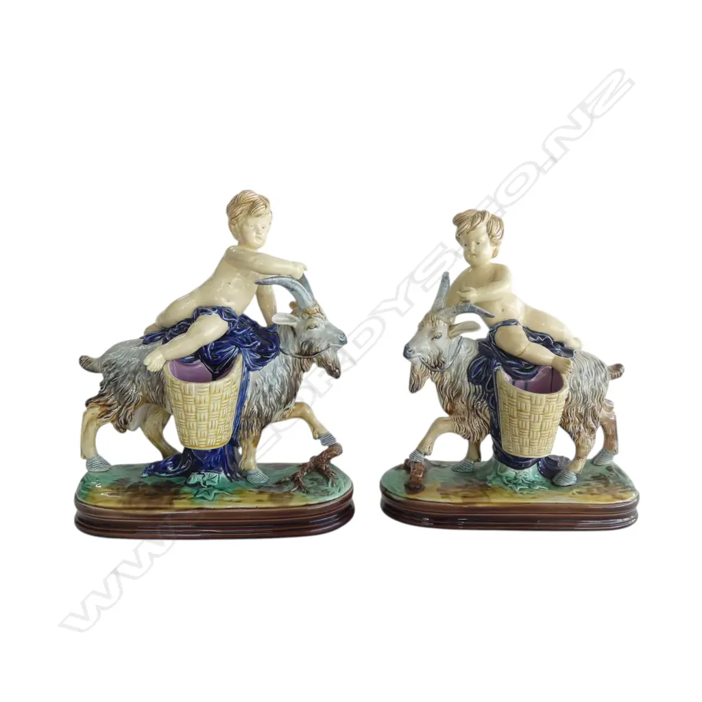 PR MAJOLICA FIGURINES, PUTTI RIDING a GOAT, in the Minton manner, both faulted Image 1++