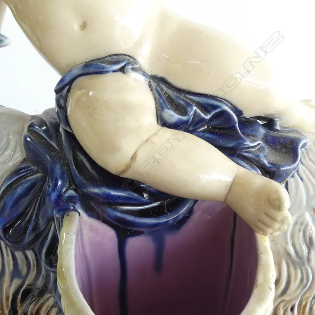 PR MAJOLICA FIGURINES, PUTTI RIDING a GOAT, in the Minton manner, both faulted Image 1++