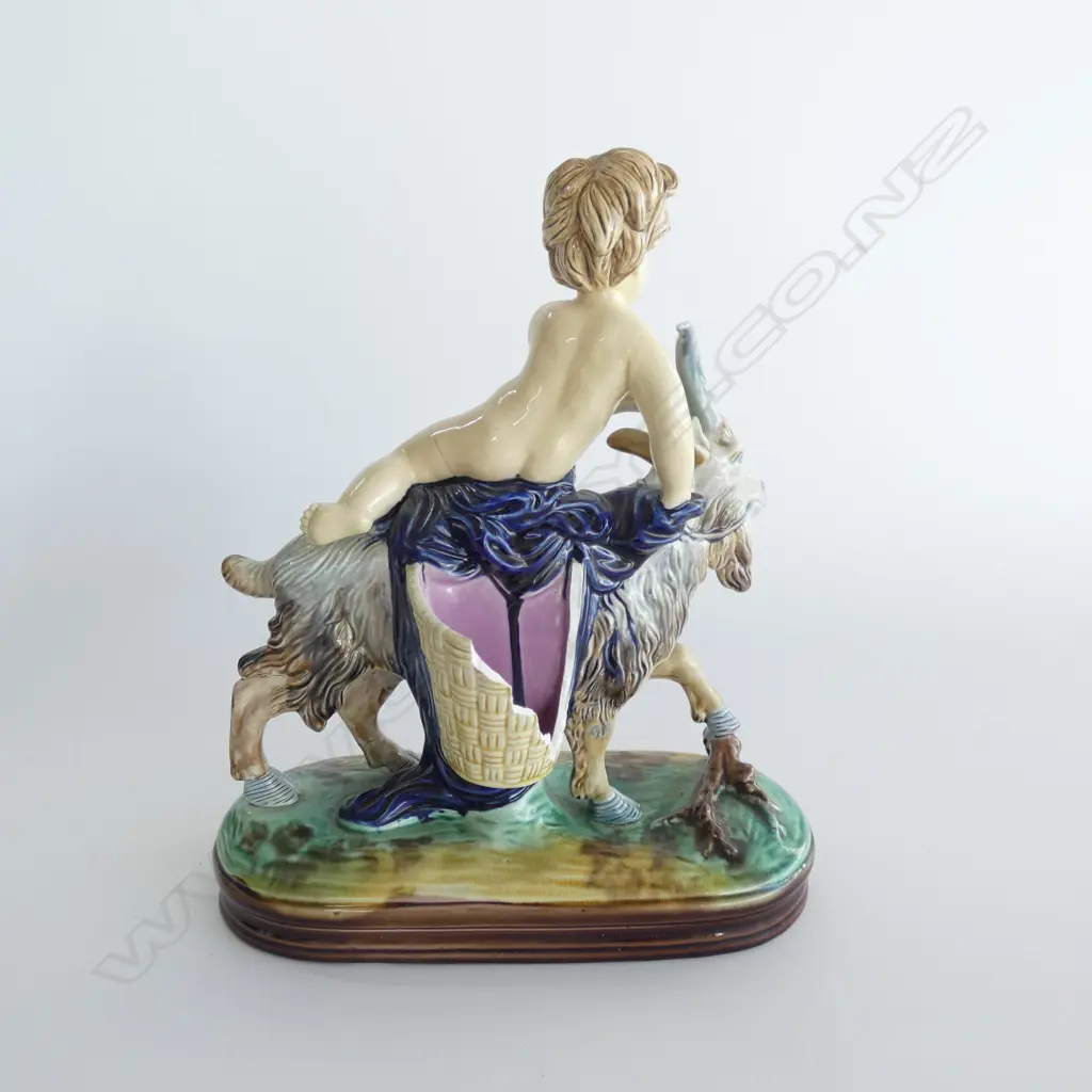 PR MAJOLICA FIGURINES, PUTTI RIDING a GOAT, in the Minton manner, both faulted Image 1++