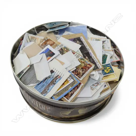 TIN ASST. LOOSE STAMPS