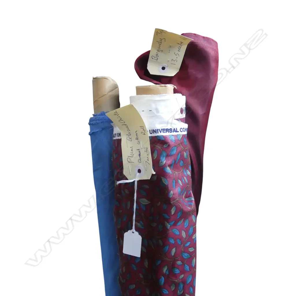 3 FABRIC BOLTS; PLUM GLAZED CHINTZ 7M, BURGUNDY TAPESTRY 13.5M & TAFFETA  BLUE 7M ROLL Image 1++
