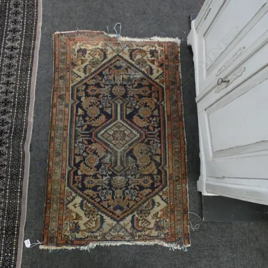 HAND KNOTTED ALL WOOL RUG, FAULTS