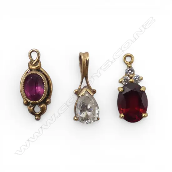 2 x  9ct GOLD & GEM SET PENDANTS 1.4gms + other plated