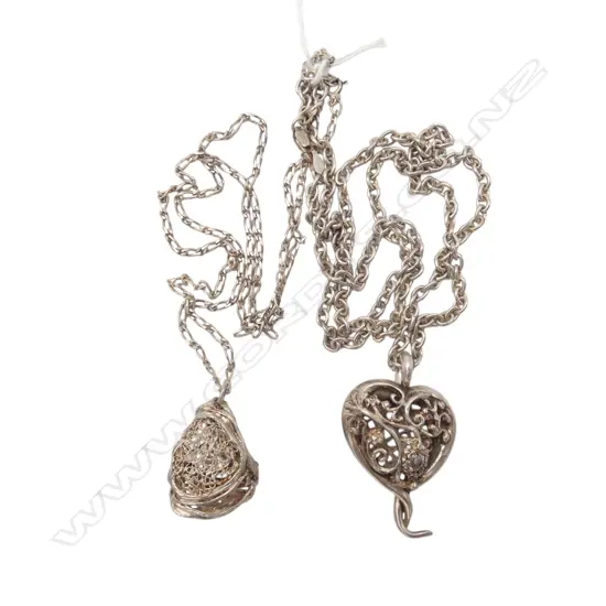 TWO STERLING SILVER PENDANTS AND CHAINS From the estate of jeweller Simon Misdale