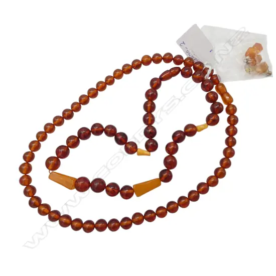 TWO AMBER BEAD NECKLACES AND A PAIR OF EARRINGS From the estate of jeweller Simon Misdale
