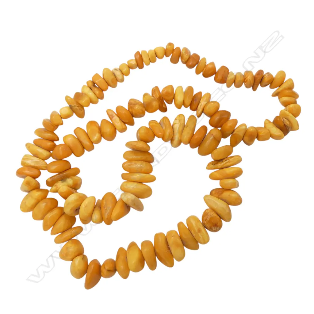 CHUNKY EGG YOKE YELLOW AMBER NECKLACE From the estate of jeweller Simon Misdale Image 1++