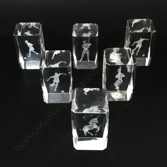  SIX CRYSTAL PAPERWEIGHTS W. 3D FOOTBALL, BASEBALL & UNICORN FIGURES, H.80MM 