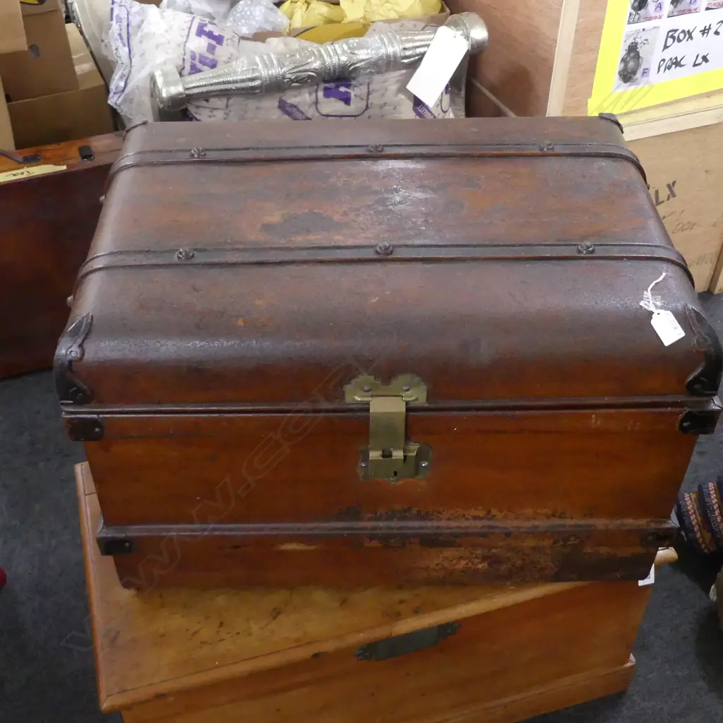 A Victorian metal trunk with studded strapping metal side handles and blue painted interior. W.700 x D.500 x H.450mm. Image 1++
