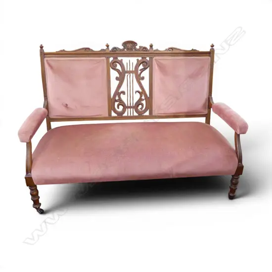 LATE VICTORIAN OAK CARVED SETTEE. LYRE BACK W.1300mm