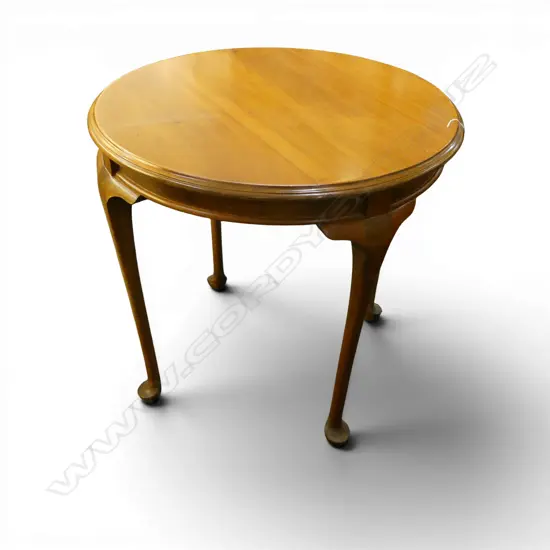 c1920 KAURI CIRCULAR CENTER TABLE. Borer to frieze. Raised on cabriole legs.