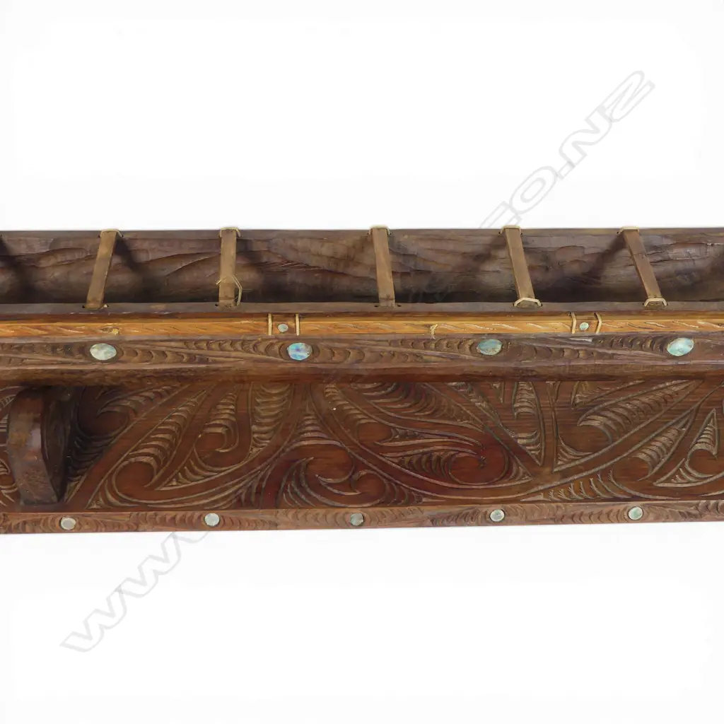 A large mid/late 20thC Māori carved wood model waka on carved stand, Image 1++