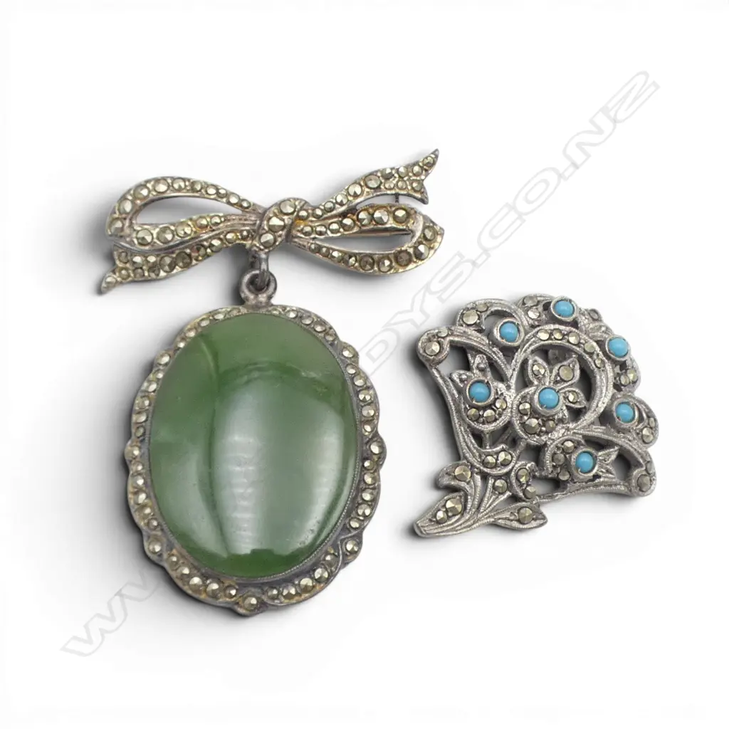 TWO SILVER AND MARCASITE BROOCHES ONE WITH POUNAMU AND ONE WITH BLUE BEADS Image 1++