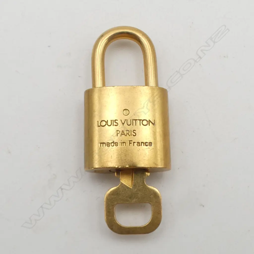 LOUIS VUITTON SML PADLOCK w KEY #300, matte finish, authentication from myhaute.co.nz Image 1++