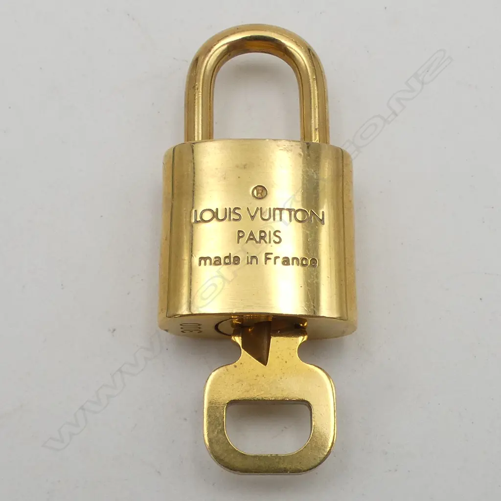 LOUIS VUITTON SML PADLOCK w KEY #300, authentication from myhaute.co.nz Image 1++