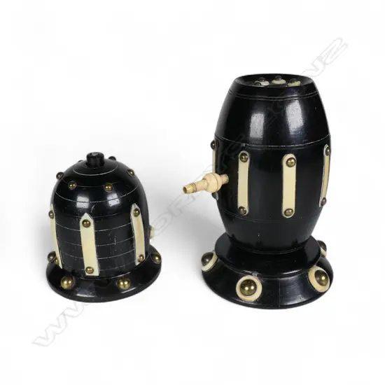 Two 19thC ebony and ivory sewing thread dispensers one of barrel form, H.105mm.