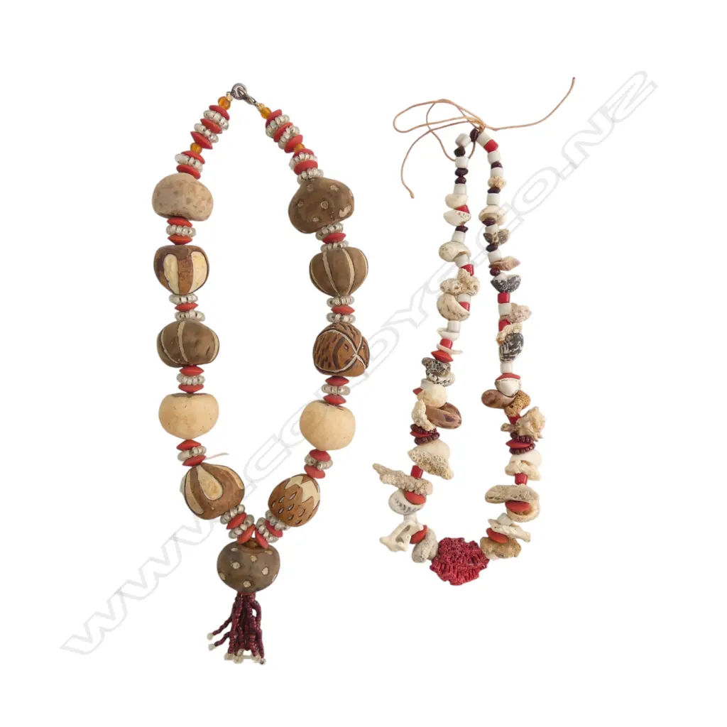 BAG CONTAINING STRING OF CORALS & BEADS  TOGETHER WITH NECKLACE OF VEGTABLE IVORY & BEADS  Image 1++