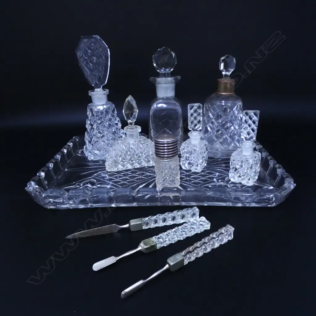 ASST. SCENT BOTTLES & OTHER VANITY ITEMS ON TRAY one w. stg silver topper W.305mm Image 1++
