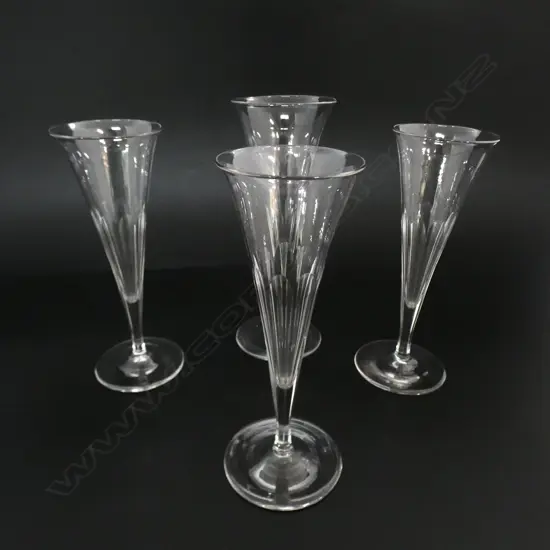 FOUR VICTORIAN CHAMPAGNE FLUTES GROUND PONTIL, H.180MM-190MM