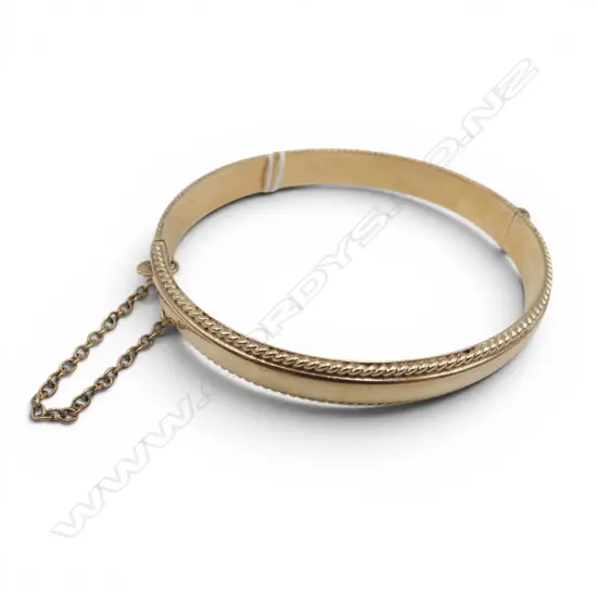 9ct HINGED BANGLE w CORDED EDGES, 19.60gm, 2017 valuation