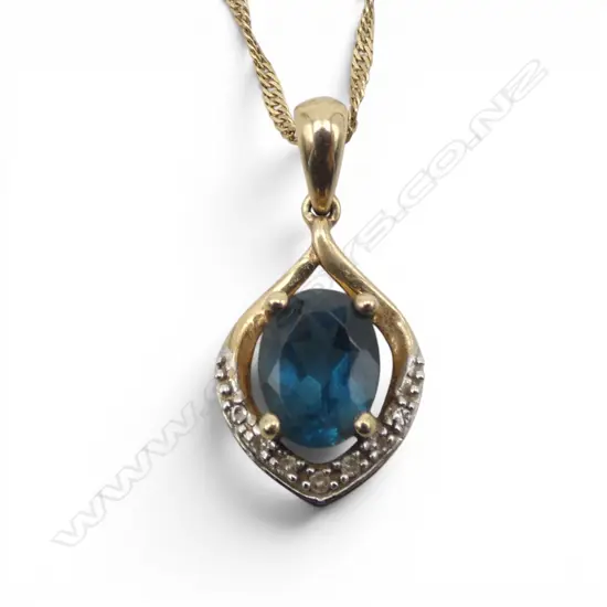 9CT BLUE TOPAZ? & DIAMOND PENDANT NECKLACE, 2.2gms