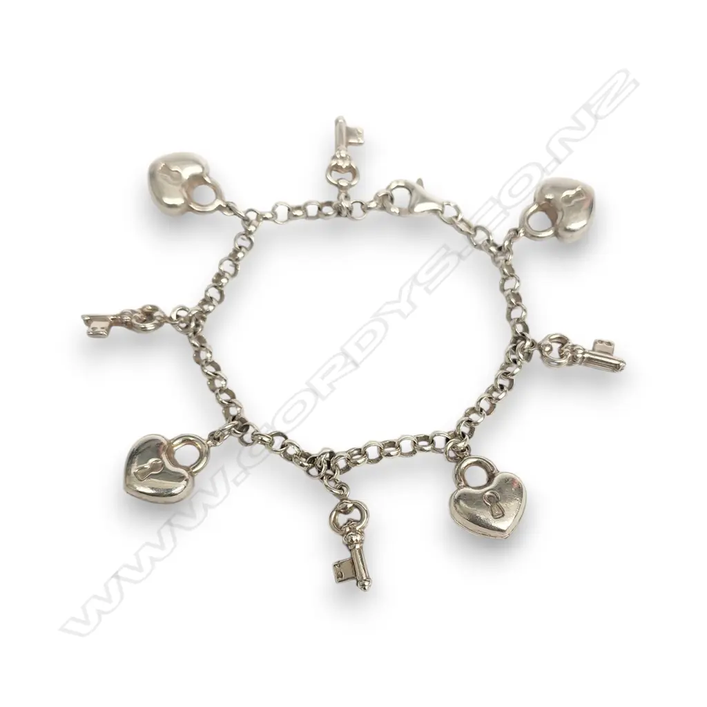 STERLING SILVER CHARM BRACELET FEATURING PUFFED HEART AND KEY PENDANTS Image 1++