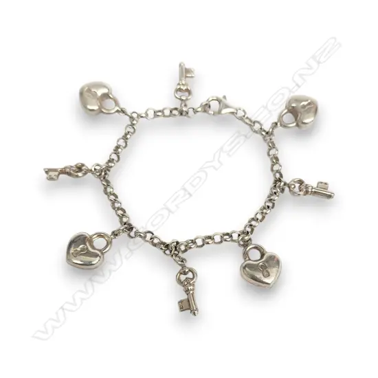 STERLING SILVER CHARM BRACELET FEATURING PUFFED HEART AND KEY PENDANTS