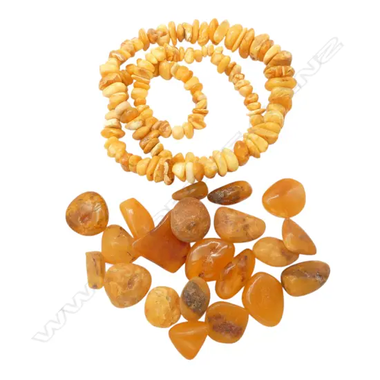 CHUNKY EGG YOKE YELLOW AMBER NECKLACE & BAG OF AMBER PIECES From the estate of jeweller Simon Misdale