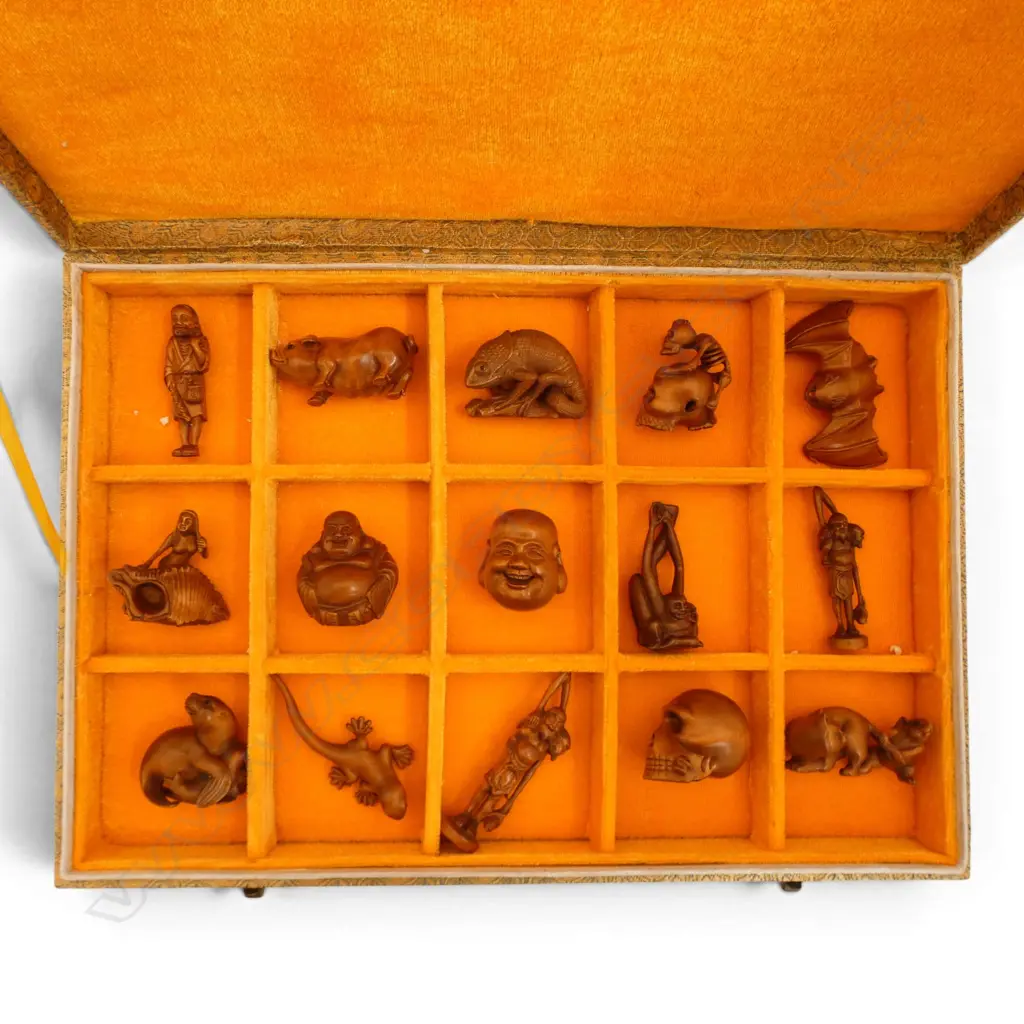 Boxed collection of 15 carved wooden signed netsukes. Various subjects including: bat - skulls - animals  etc. Image 1++