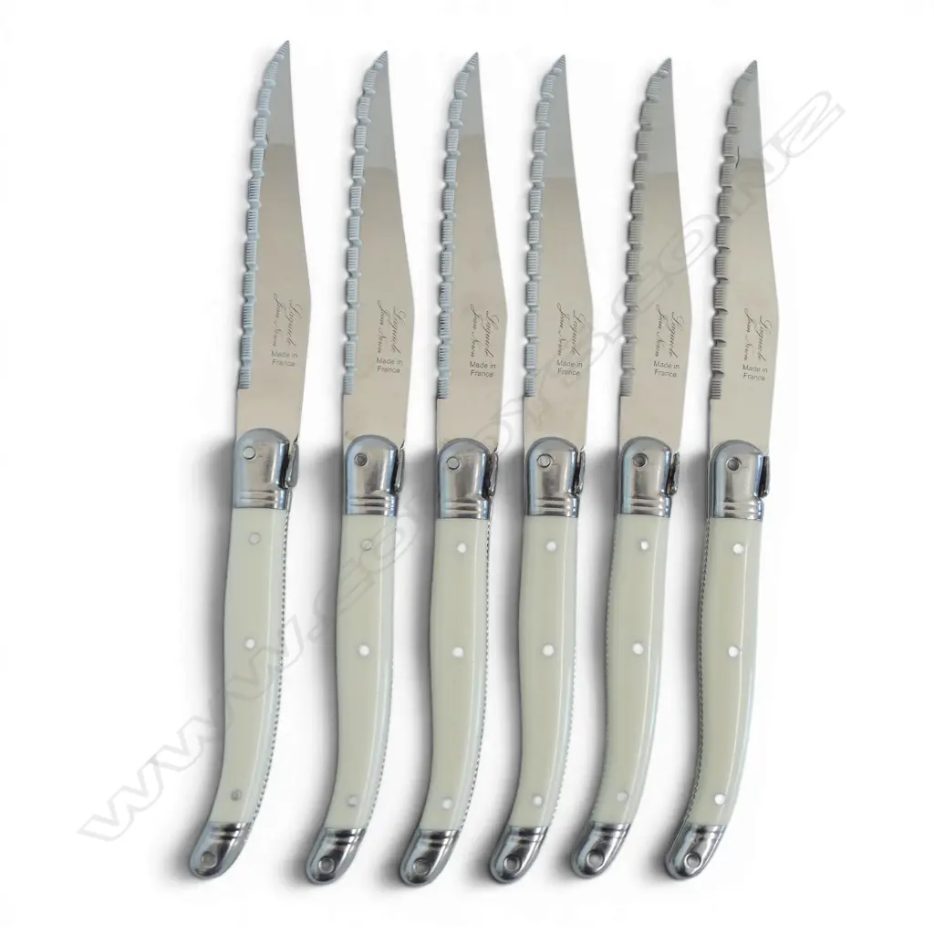 6 LAGUIOLE WHITE HANDLED STEAK KNIVES MADE IN FRANCE Image 1++