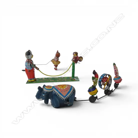 2 WIND UP TIN TOYS; SKIPPING ROPE, CIRCUS PARADE L.290mm