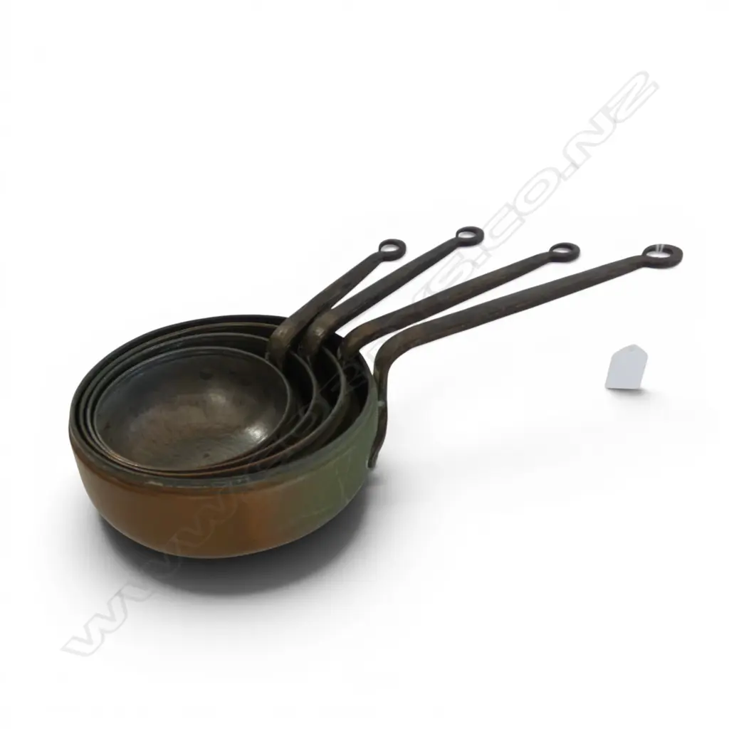 FOUR GRADUATING ANTIQUE HAND-FORGED ROUND-BOTTOM COPPER POTS (SWEET MAKING) Image 1++