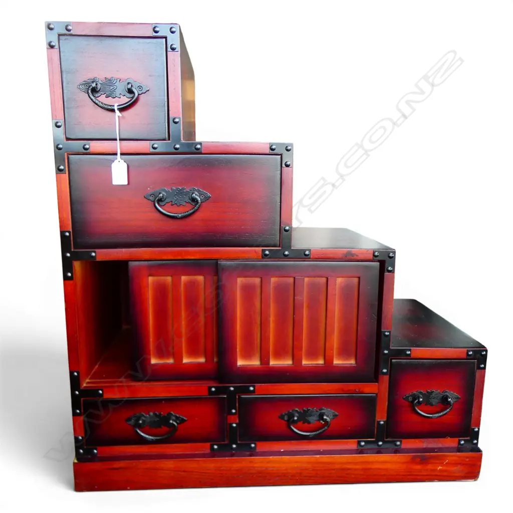 JAPANESE PAULOWNIA WOOD KAIDAN TANSU (small step chest) H.700mm W.670mm. D.340mm, Red & dark edged finish. Late 20thC Image 1++
