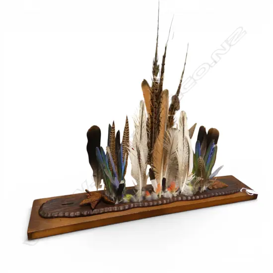 A FEATHER DISPLAY on long Japanese board w shaped edge L.710mm. 