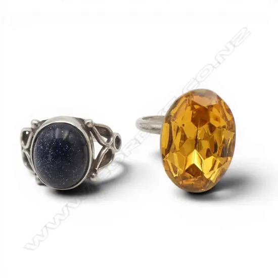 2 STG SILVER RINGS SIZE O yellow.  & J blue stone
