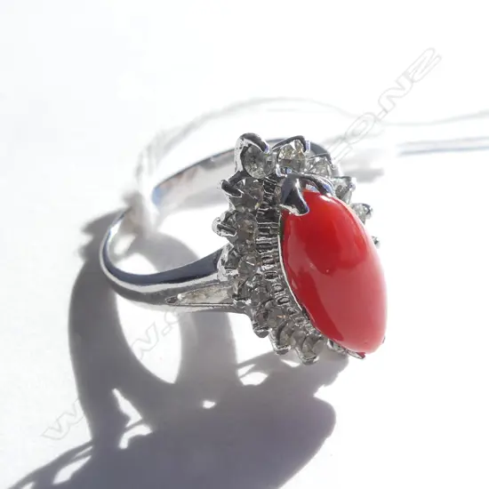 NICKLE PLATED CORAL? RING WHITE STONES SIZE K 1/2. (Not gold)