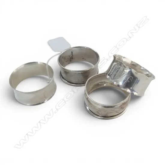 4 STG SILVER NAPKIN RINGS two with early 20thC english hallmarks 53gms TW