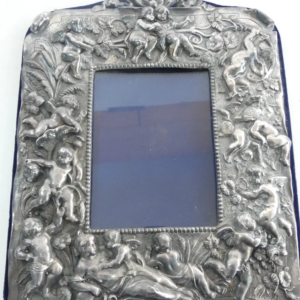 STG SILVER PHOTO FRAME w detailed relief of cherubs, H.280 x 210mm, hallmarked Image 1++