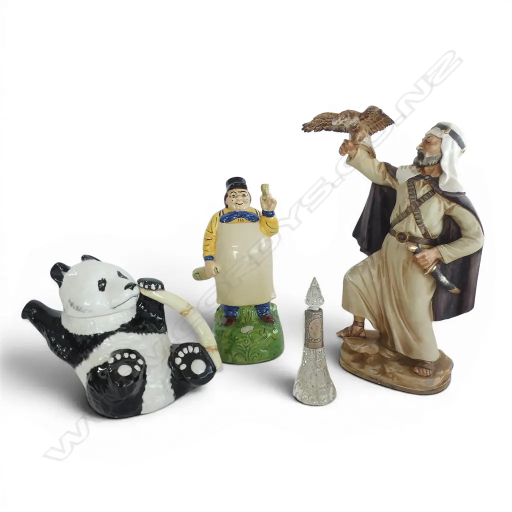 4 PCES; STG SILVER RIMMED BOTTLE (AF), BESWICK PANDA TEAPOT, GERMAN MUSICAL FIGURINE, ARAB MAN w. EAGLE H.310mm Image 1++