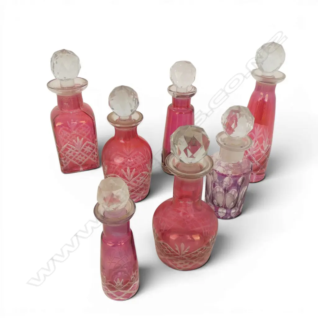 COLLECTION OF 7 RUBY GLASS STOPPERED DRESSINGTABLE BOTTLES H170 MM TALLEST Image 1++