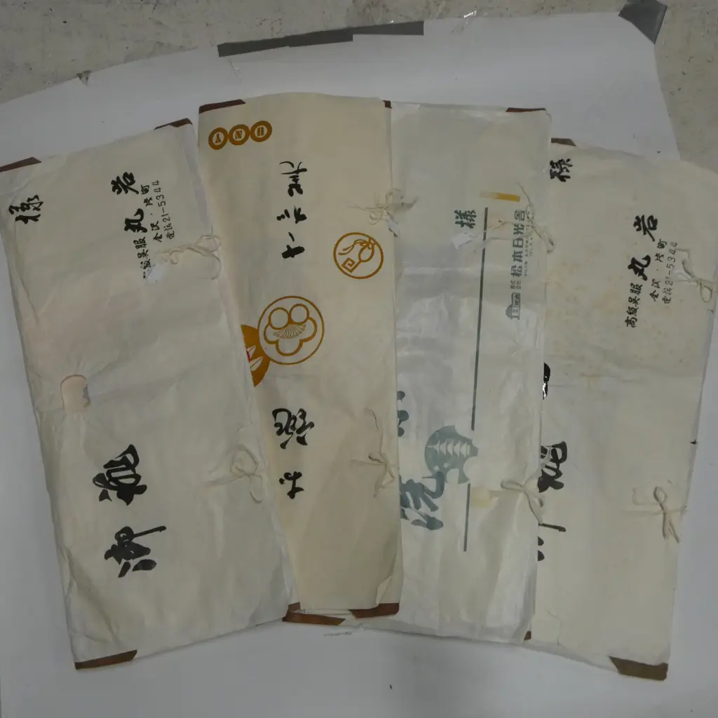 FOUR VINTAGE KIMONO IN ORIGINAL PACKAGING Image 1++